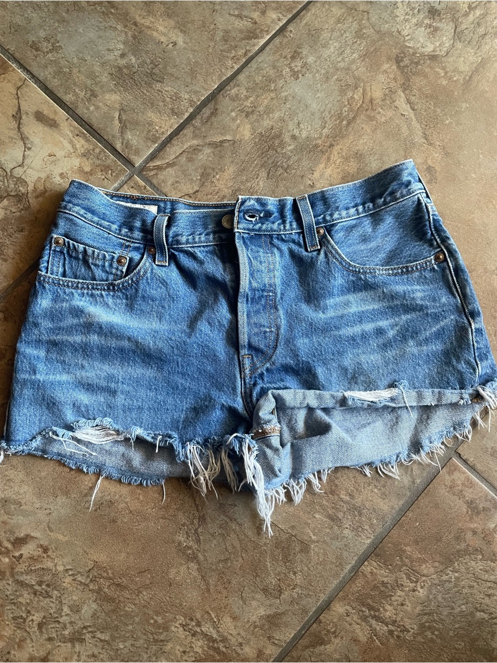 Levi's Distressed Light Blue Denim Cutoff Shorts